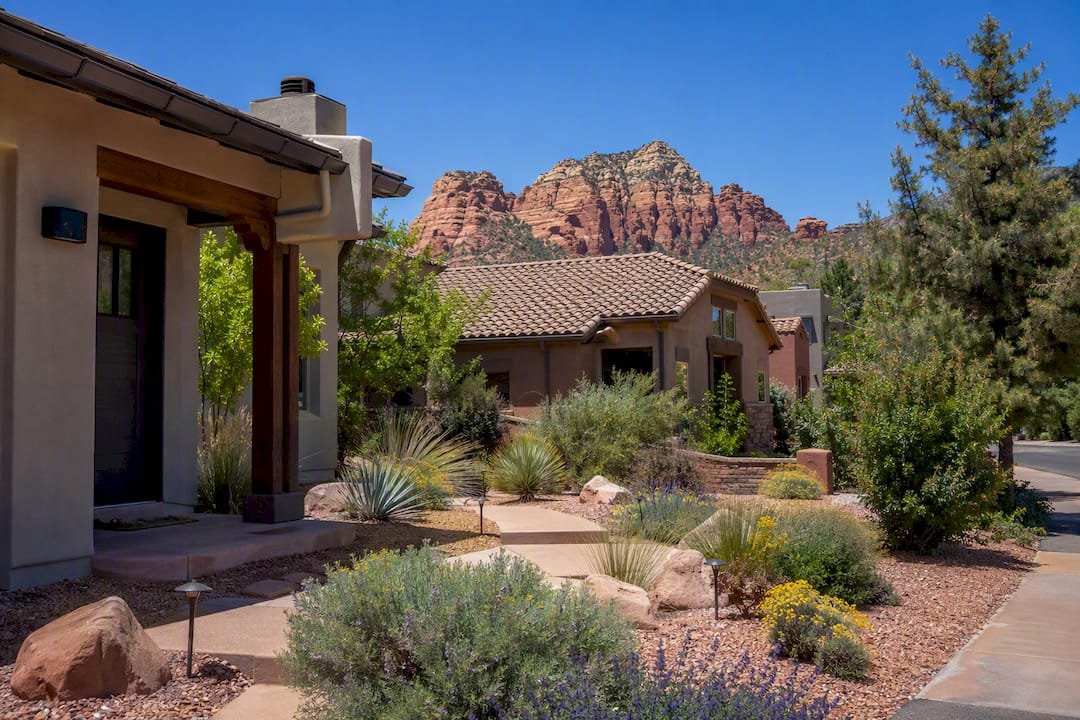 Sedona neighborhood showing homes with permit signs and landscaping