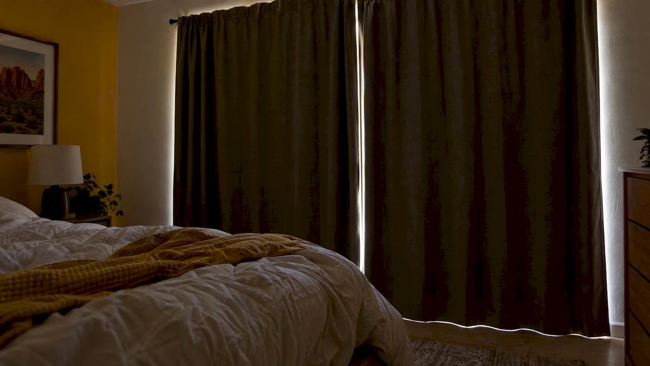 Blackout curtains in a Sedona rental bedroom